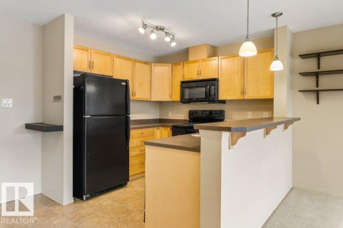 #203 5951 165 Av Nw, Edmonton, AB - Indoor Photo Showing Kitchen