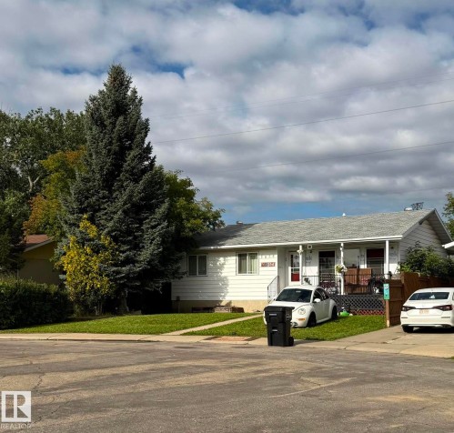 Single-story residence featuring white siding and a covered front porch - 8824 30 Avenue Nw, Edmonton, AB - Outdoor