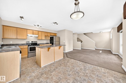 #54 12050 17 Av Sw, Edmonton, AB - Indoor Photo Showing Kitchen With Double Sink