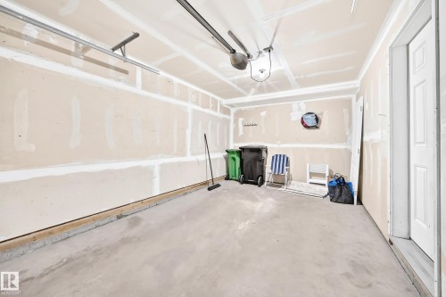 #54 12050 17 Av Sw, Edmonton, AB - Indoor Photo Showing Garage