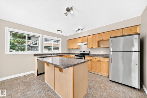 #54 12050 17 Av Sw, Edmonton, AB - Indoor Photo Showing Kitchen With Double Sink