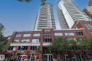 Contemporary high-rise architecture with curved glass facades and private balconies - #1004 10136 104 St Nw, Edmonton, AB  - Outdoor With Balcony With Facade 