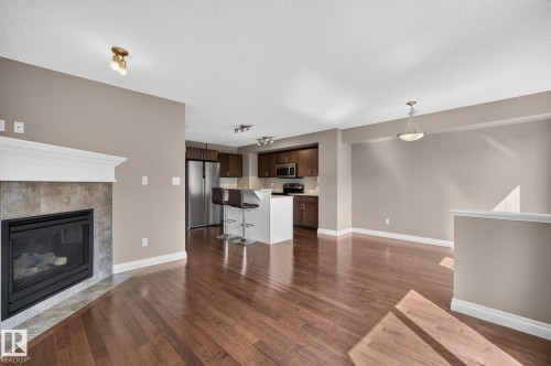 1107 177 Street Sw, Edmonton, AB - Indoor Photo Showing Other Room With Fireplace