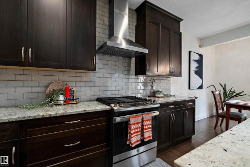 15832 11 Avenue Sw, Edmonton, AB - Indoor Photo Showing Kitchen With Upgraded Kitchen