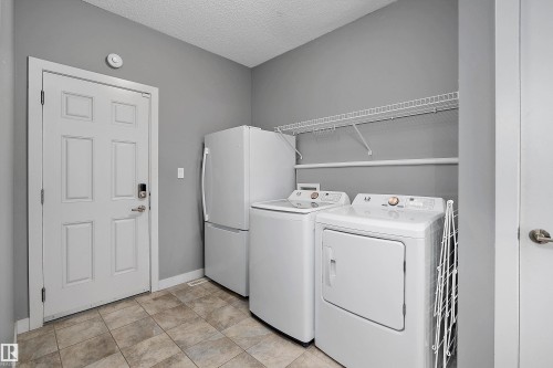 15832 11 Avenue Sw, Edmonton, AB - Indoor Photo Showing Laundry Room