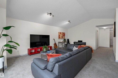 15832 11 Avenue Sw, Edmonton, AB - Indoor Photo Showing Living Room