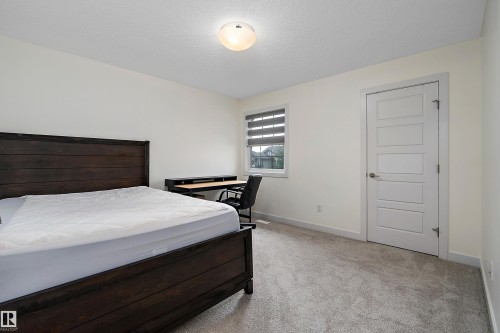 15832 11 Avenue Sw, Edmonton, AB - Indoor Photo Showing Bedroom