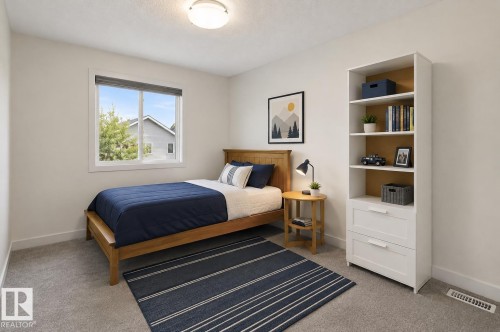 15832 11 Avenue Sw, Edmonton, AB - Indoor Photo Showing Bedroom