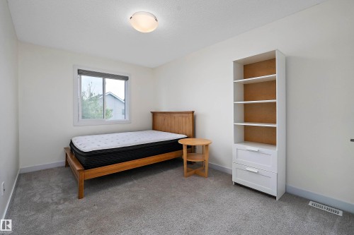 15832 11 Avenue Sw, Edmonton, AB - Indoor Photo Showing Bedroom