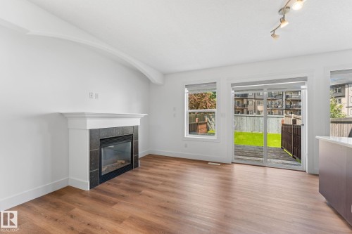 5964 164 Avenue Nw, Edmonton, AB - Indoor Photo Showing Living Room With Fireplace
