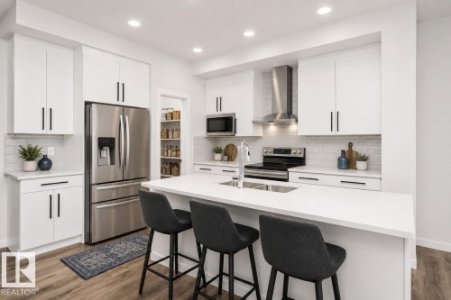 307 Linden Loop, Leduc, AB - Indoor Photo Showing Kitchen With Double Sink With Upgraded Kitchen