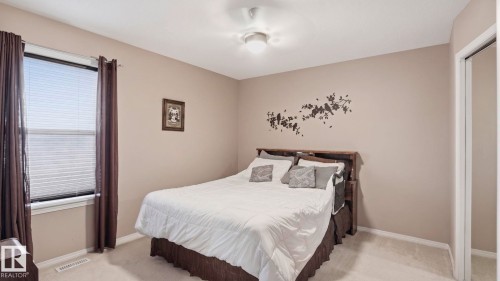 50 Snowbird Crescent, Leduc, AB - Indoor Photo Showing Bedroom