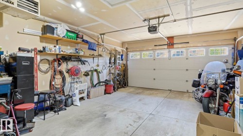 50 Snowbird Crescent, Leduc, AB - Indoor Photo Showing Garage