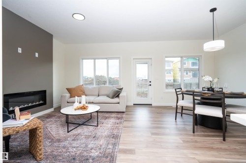 2623 5 Avenue Sw, Edmonton, AB - Indoor Photo Showing Living Room With Fireplace