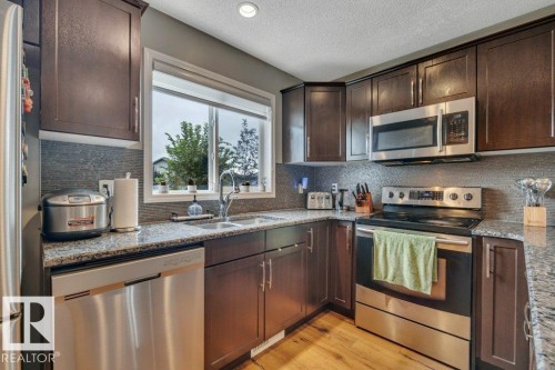 723 Secord Boulevard Nw, Edmonton, AB - Indoor Photo Showing Kitchen With Double Sink With Upgraded Kitchen