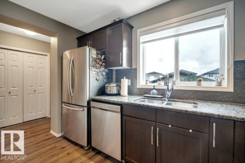 723 Secord Boulevard Nw, Edmonton, AB - Indoor Photo Showing Kitchen With Double Sink