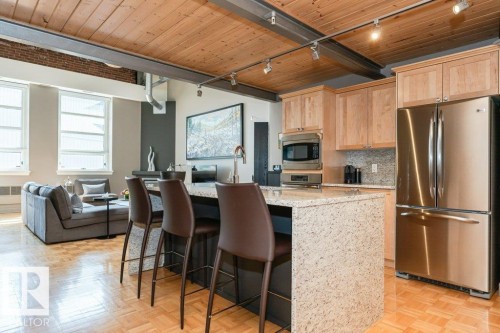 #203 10009 102 Av Nw, Edmonton, AB - Indoor Photo Showing Kitchen With Stainless Steel Kitchen