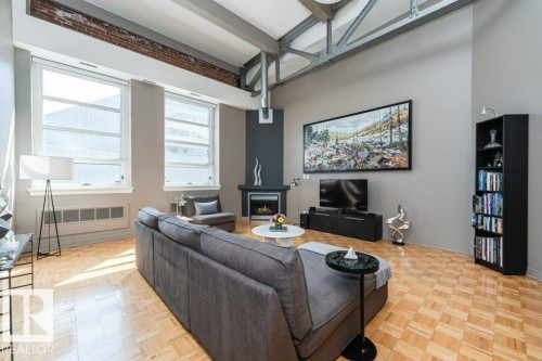 #203 10009 102 Av Nw, Edmonton, AB - Indoor With Fireplace