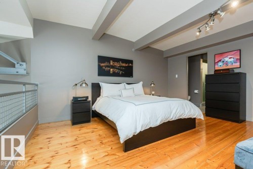 #203 10009 102 Av Nw, Edmonton, AB - Indoor Photo Showing Bedroom