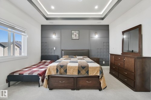 Recessed lighting in a tray ceiling - 4820 174 Avenue Nw, Edmonton, AB - Indoor Photo Showing Bedroom