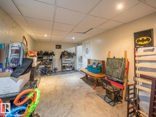 Carpeted flooring, recessed lighting, and a drop ceiling - #No 510 Abbottsfield Rd Nw Nw, Edmonton, AB - Indoor