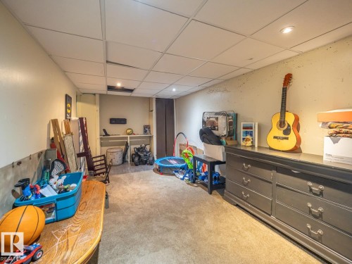 Carpeted flooring, drop ceiling, and recessed lighting - #No 510 Abbottsfield Rd Nw Nw, Edmonton, AB - Indoor Photo Showing Other Room