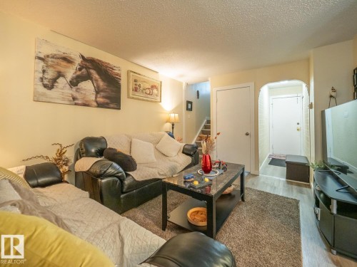 Additional content - #No 510 Abbottsfield Rd Nw Nw, Edmonton, AB - Indoor Photo Showing Living Room