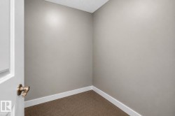 Neutral wall color, wall-to-wall carpeting, and bright white trim - 