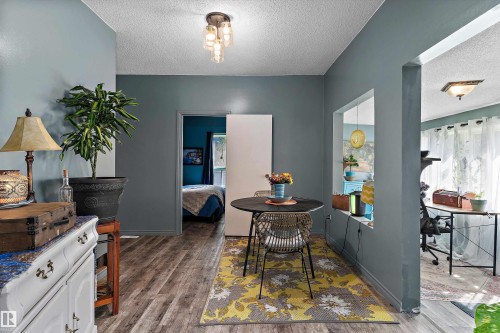 Wood-finish flooring throughout - 5404 45 Avenue, Wetaskiwin, AB - Indoor