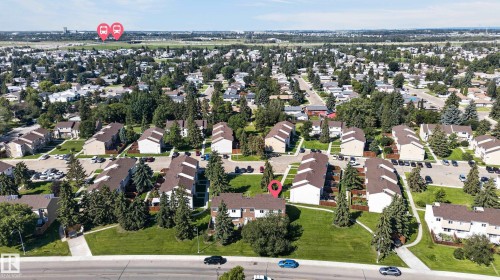 Expansive neighborhood with numerous residential buildings, mature trees, and paved roads - 18247 93 Avenue Nw, Edmonton, AB - Outdoor With View