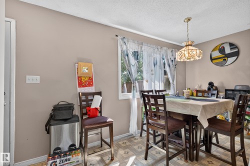 Window with white trim - 18247 93 Avenue Nw, Edmonton, AB - Indoor Photo Showing Dining Room