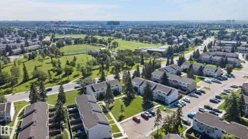 Residential community featuring townhomes and surface parking - 18247 93 Avenue Nw, Edmonton, AB - Outdoor With View