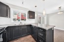 #73 9535 217 St Nw, Edmonton, AB  - Indoor Photo Showing Kitchen With Double Sink 