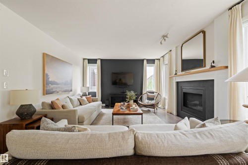 3722 Kidd Crescent Sw, Edmonton, AB - Indoor Photo Showing Living Room With Fireplace