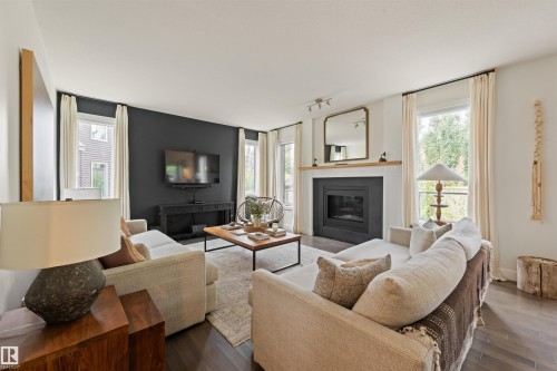 3722 Kidd Crescent Sw, Edmonton, AB - Indoor Photo Showing Living Room With Fireplace