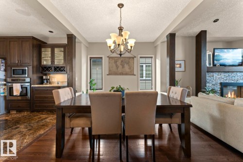 2303 2 Avenue, Cold Lake, AB - Indoor Photo Showing Dining Room With Fireplace