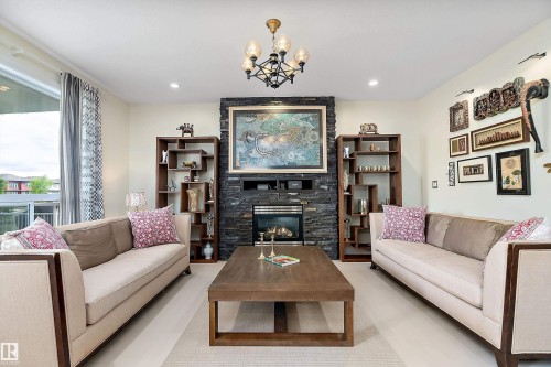 164 Durrand Bend, Fort Saskatchewan, AB - Indoor Photo Showing Living Room With Fireplace
