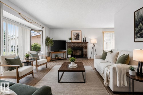 13050 32A Street Nw, Edmonton, AB - Indoor Photo Showing Living Room With Fireplace