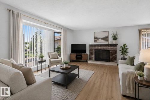 13050 32A Street Nw, Edmonton, AB - Indoor Photo Showing Living Room With Fireplace