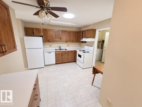 1552 54 Street Nw, Edmonton, AB - Indoor Photo Showing Kitchen With Double Sink
