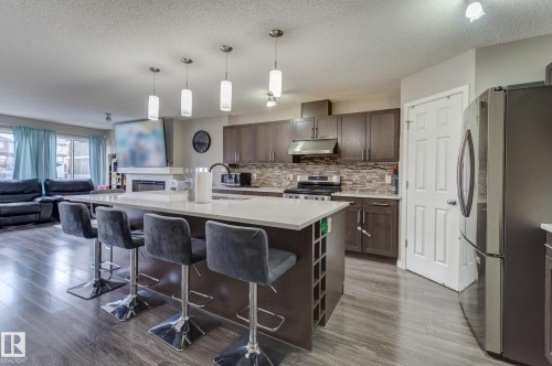 6706 24 Avenue Sw, Edmonton, AB - Indoor Photo Showing Kitchen With Stainless Steel Kitchen With Upgraded Kitchen