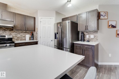 6706 24 Avenue Sw, Edmonton, AB - Indoor Photo Showing Kitchen With Stainless Steel Kitchen