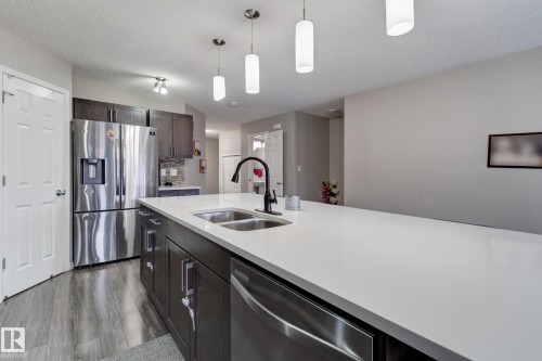 6706 24 Avenue Sw, Edmonton, AB - Indoor Photo Showing Kitchen With Stainless Steel Kitchen With Double Sink With Upgraded Kitchen