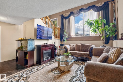 16351 119 Street Nw, Edmonton, AB - Indoor Photo Showing Living Room With Fireplace