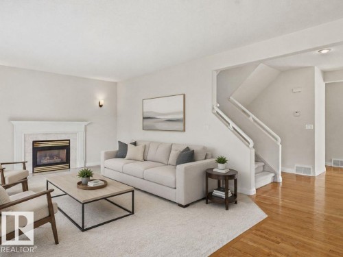 11568 15 Avenue Nw, Edmonton, AB - Indoor Photo Showing Living Room With Fireplace