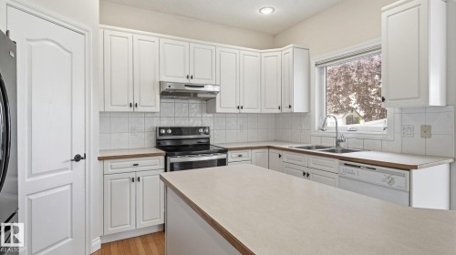 11568 15 Avenue Nw, Edmonton, AB - Indoor Photo Showing Kitchen With Double Sink