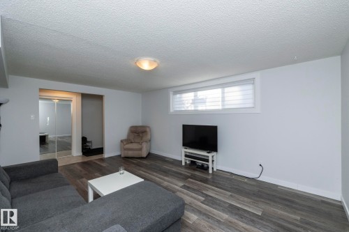 11427 90 Street Nw, Edmonton, AB - Indoor Photo Showing Living Room