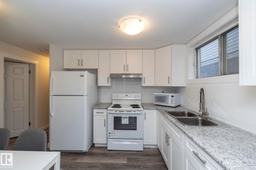 11427 90 Street Nw, Edmonton, AB - Indoor Photo Showing Kitchen With Double Sink