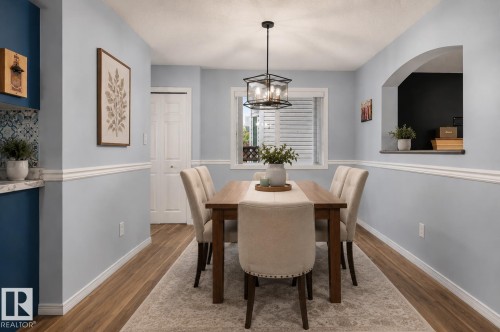 Dining area Virtually staged - 3755 20 Street Nw, Edmonton, AB - Indoor Photo Showing Dining Room