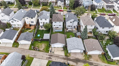 Residential street with detached garages and private backyards - 3755 20 Street Nw, Edmonton, AB - Outdoor With View